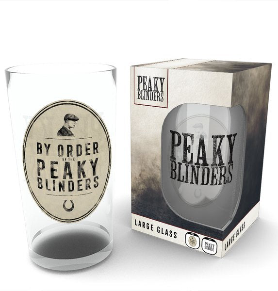 A glass etched with the text "By Order of the Peaky Blinders" referencing the popular TV show